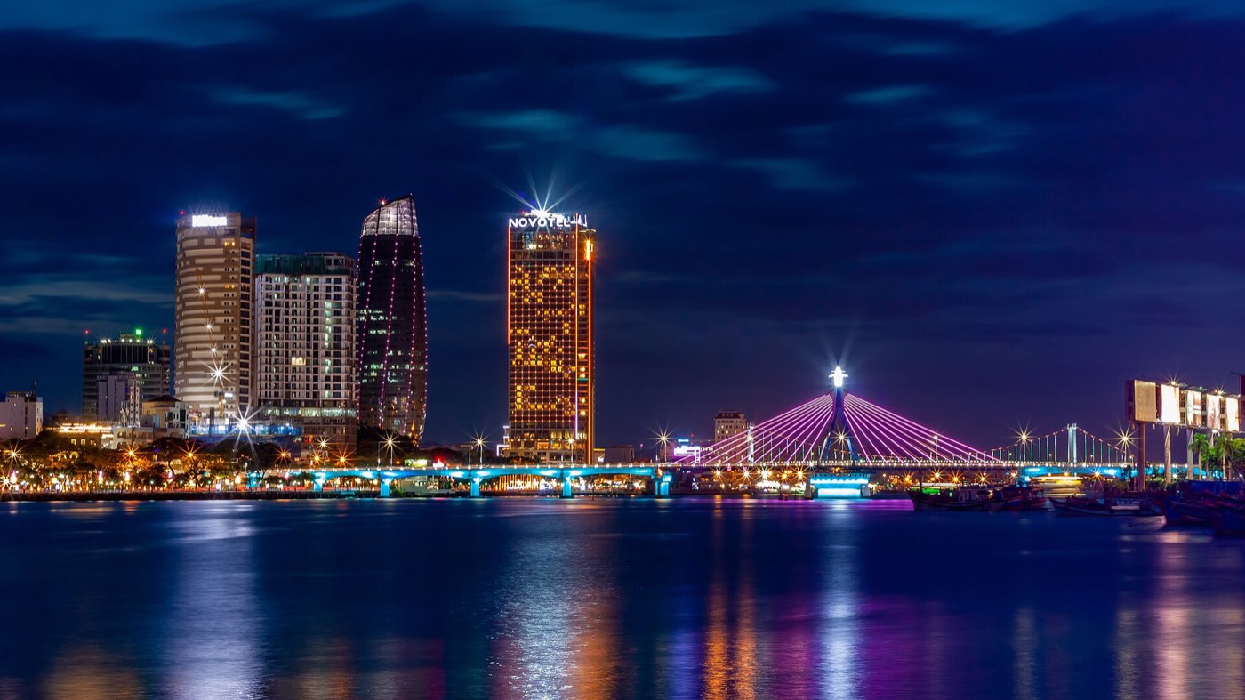 The Han River Bridge lit at night in Da Nang